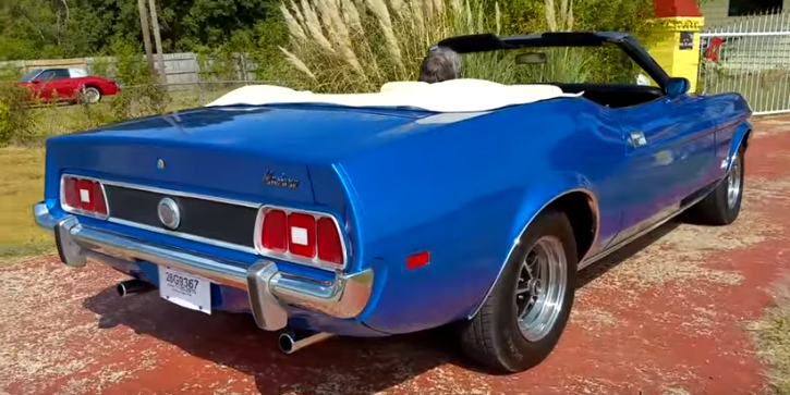 convertible 1973 mustang in blue glow