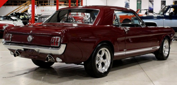 custom 1965 mustang coupe in vintage burgundy