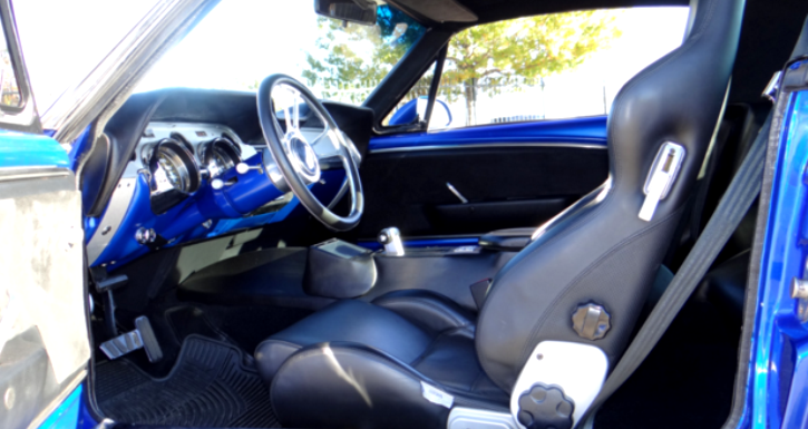 customized 1967 ford mustang in blue