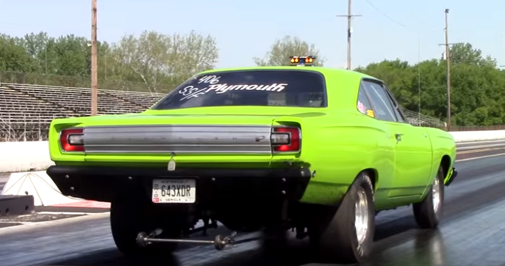 green plymouth road runner drag racing at national trails raceway