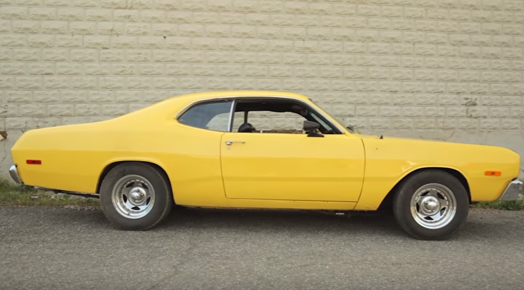 yellow 1973 dodge dart 318